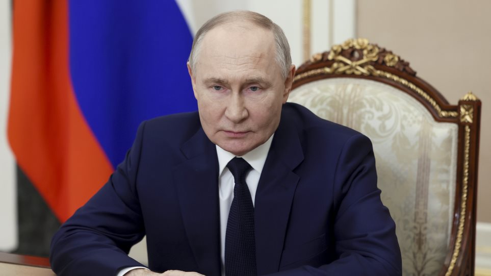 AP_Putin___Mikhail_Metzel1