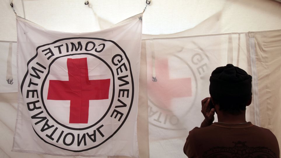 Erithros_Stavros_simea_AP_Photo_Lefteris_Pitarakis