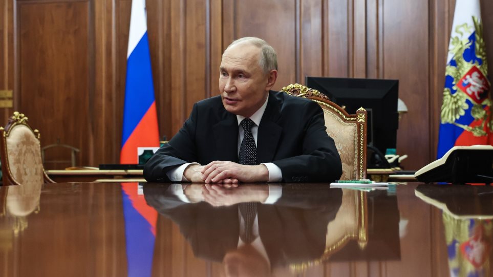 Putin_Mikhail_AP_Photo_Metzel_Sputnik