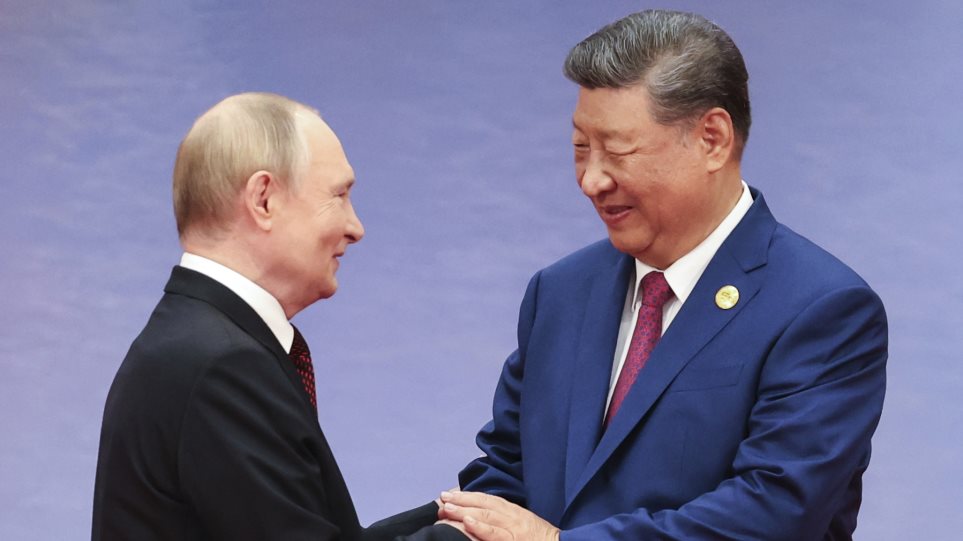 Putin_Si_AP_photo_Alexander_Kazakov
