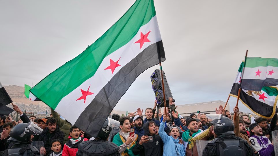 Syria_panigirismi_AP_Photo_Hussein_Malla