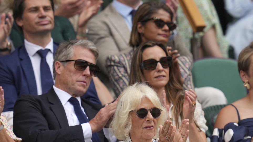 grand_kamila_tennis_AP_Photo_Kin_Cheung