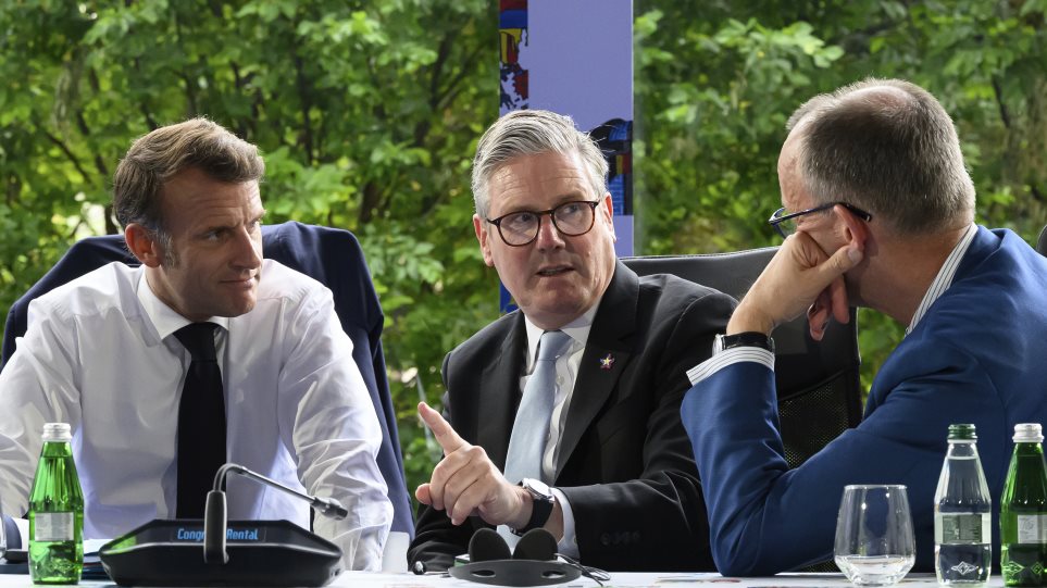 merts_macron_starmer_AP_Photo_Leon_Neal