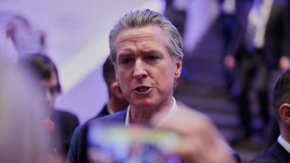 niusom_davos_AP_Photo_Markus_Schreiber